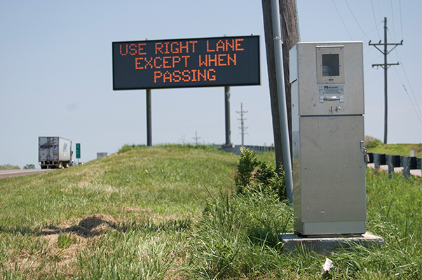 A Milbank pedestal mounted next to a traffic control cabinet.