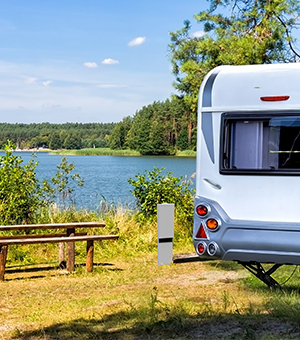 A Milbank Millennium pedestal postioned next to an RV.