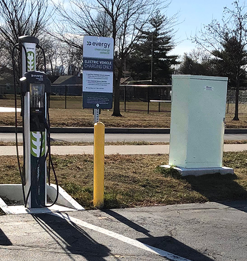 Milbank enclosed control distributing power to Evergy EV charging station.